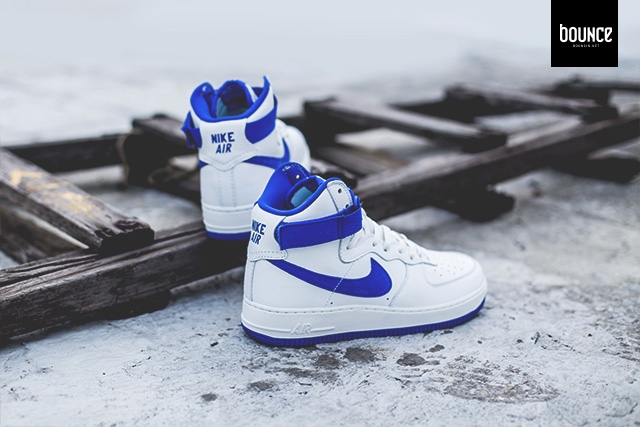 white and blue high top nikes